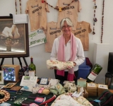 Cindy-Rogers-brought-a-variety-of-items-from-the-Evergreen-Conservancy-to-sale-at-the-Bazaar