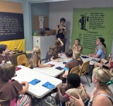 The RE summer program focused on Jedi Training. With teacher, Liz Cook, shown instructing, students leaned to master skills- sewing, gardening, meditation, singing, and Tai Chi.